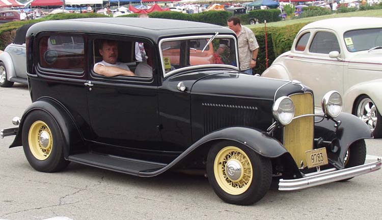 LOOK at the fuel tank on the 1932 Ford tudor below